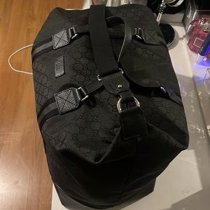 Black Gucci nylon gg weekender bag